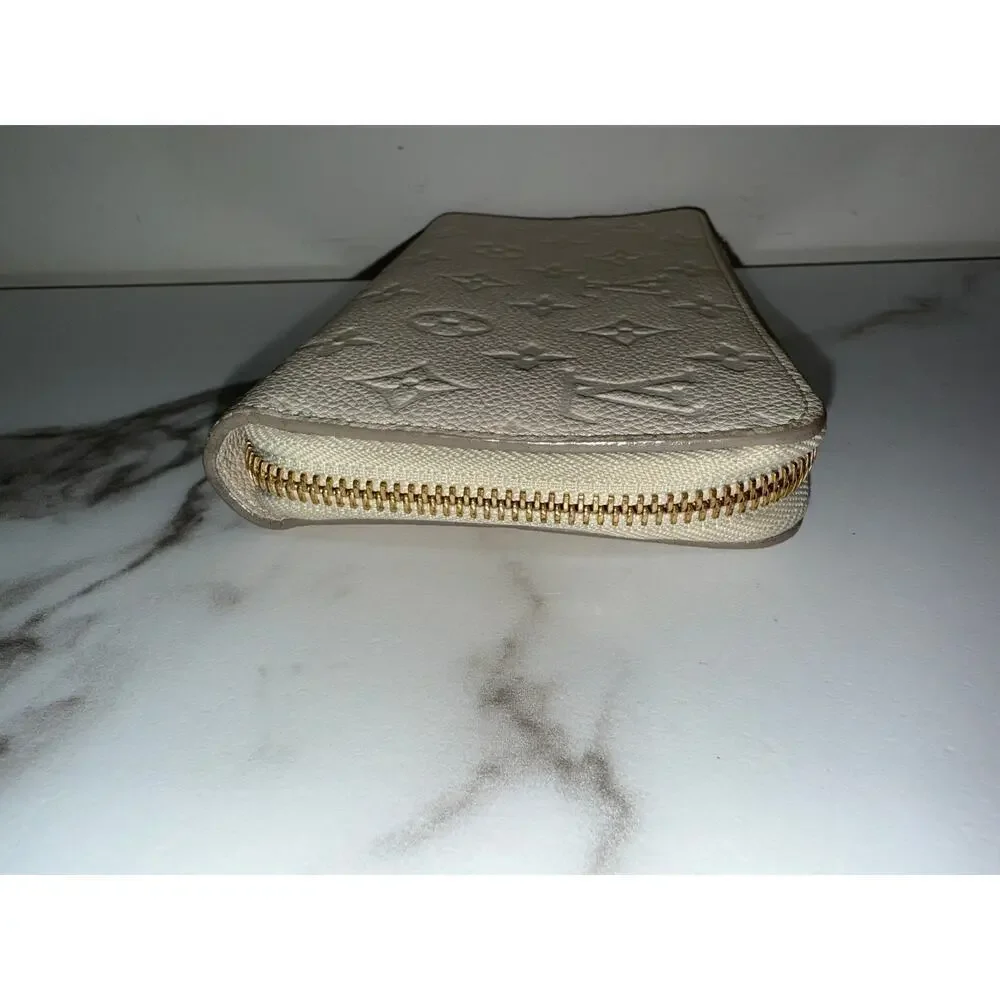 Louis Vuitton Zippy Wallet in Cream Empreinte Leather